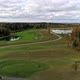 Aerial View of Golf Course Near the Forest - VideoHive Item for Sale