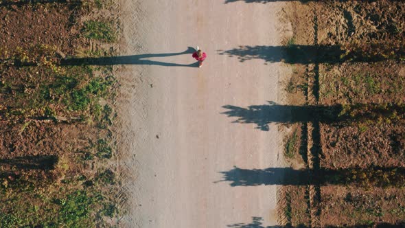 Tourist Explores Scenic Agricultural Terrain