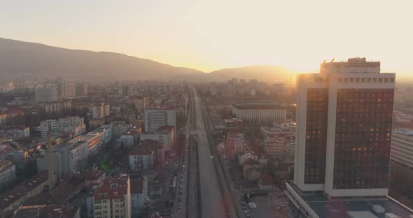 Tall Office Building at Sunset with Peaceful City Boulevard in Sofia, Bulgaria alt