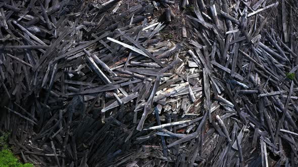 A mass of old wooden planks lying in disorder