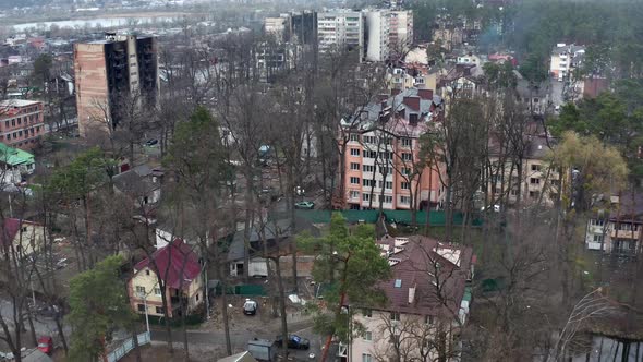 Aerial view of the destroyed and burnt houses. alt