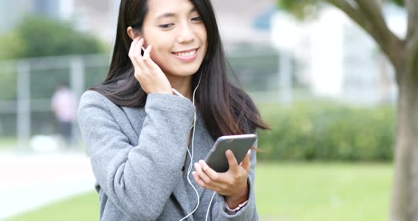 Woman use of smart phone in Hong Kong