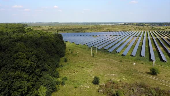 Solar Batteries In The Field. Solar power station energy from natural in the countryside