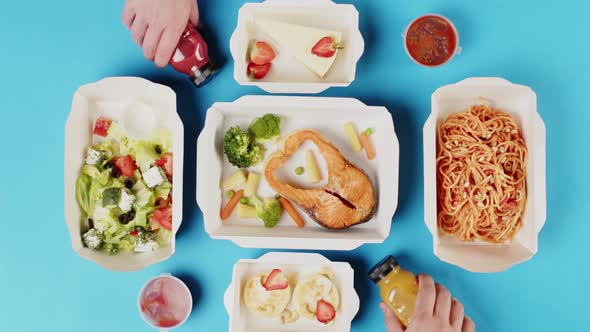 Food Delivery Top View Take Away Meals in Disposable Containers on Blue Background