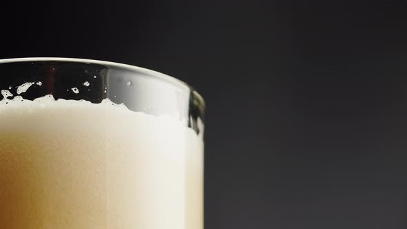 Foamy Beer in Glass Closeup