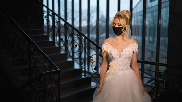 Beautiful Bride Black Face Mask Wedding Dress Poses Near Window