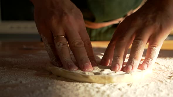 Master Chef of Italian Food Restaurant Form Pizza Dough By Kneading It in Flour