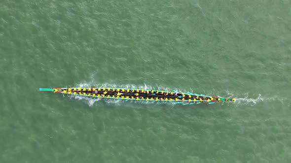 Aerial view of a long canoe in a river, Chittagong, Bangladesh.