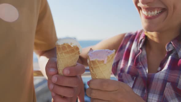 Young adult couple relaxing at the seaside