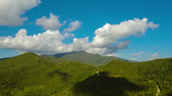 Mountains Covered with Rainforest and Clouds Timelapse