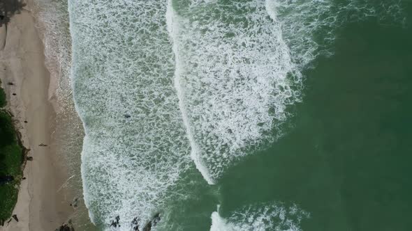 Phuket sea beautiful waves crashing on beach Aerial view