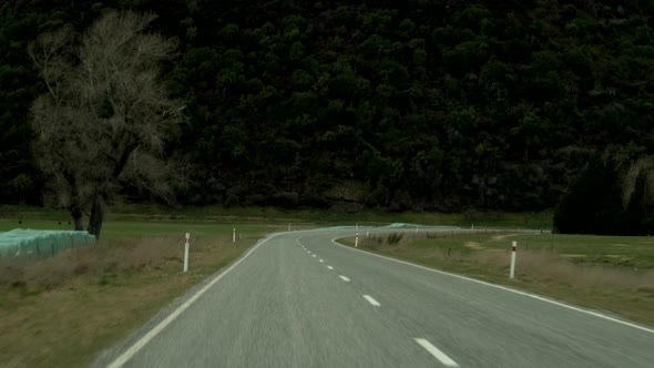 A first person view of driving through the beautiful country of New Zealand