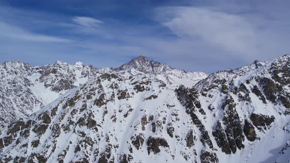 Winter drone flight over Mestia`s mountains in gerorgia. Tetnuldi Ski Resort next to Uschba and Tet