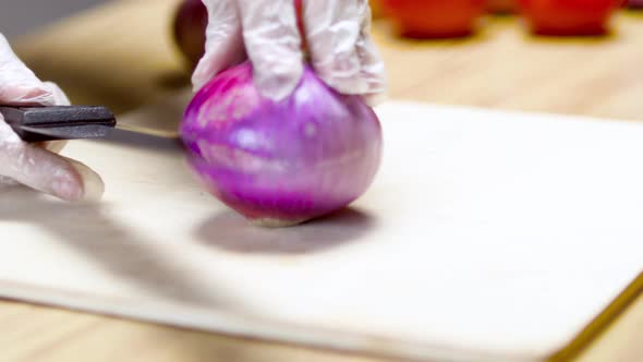 Chef Cutting Onion