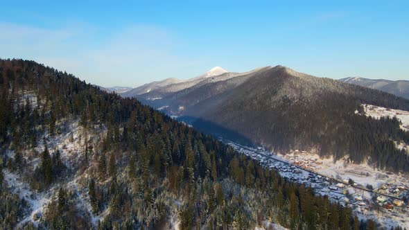 Tops of the Mountains Are Covered with snowAerial Drone View Beautiful Winter Mountains and a Valley