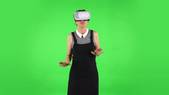 Funny Girl with Virtual Reality Headset or 3d Glasses, Green Screen
