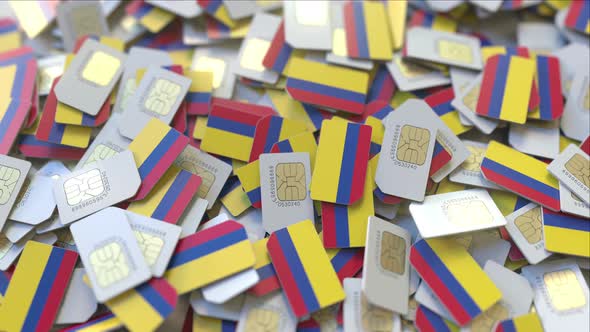 Pile of SIM Cards with Flag of Colombia