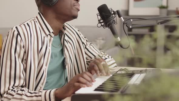 African-American Man Making Electronic and Signing