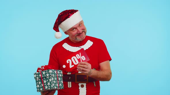 Man in Red Christmas Tshirt Showing Gift Box and 20 Percent Discount Inscriptions Banner Text Note