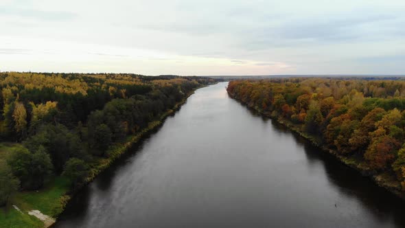 Aerial View. Flying Over the River. Beautiful Autumn Day