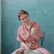 Female Potter Sitting and Makes a Cup on the Pottery Wheel. Woman Making Ceramic Item. Pottery - VideoHive Item for Sale