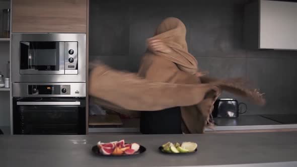 Joyful Man Prepared Healthy Breakfast at Kitchen at Home While Dancing and Making Fun Covered with