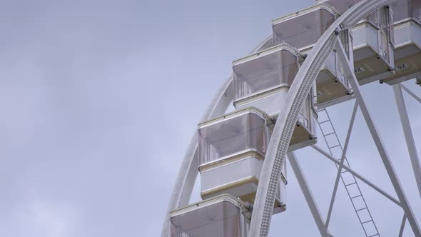 Close up of rotating ferris wheel