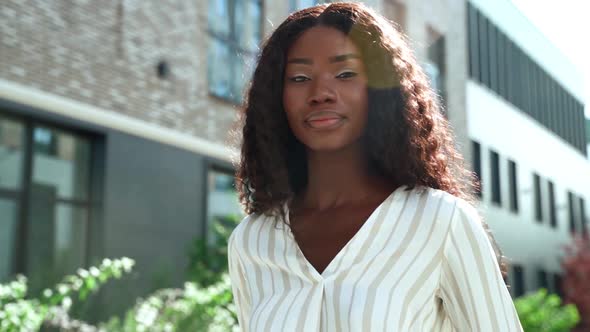 Happy Smiling Young Black African Woman Standing Outdoors