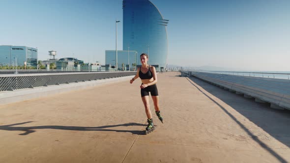 Female on Roller Blades Using Smart Watch