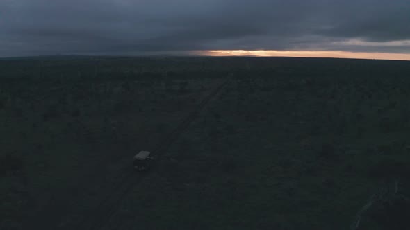 Aerial drone view of wildlife safari adventure holiday at sunrise in Laikipia, Kenya, Africa