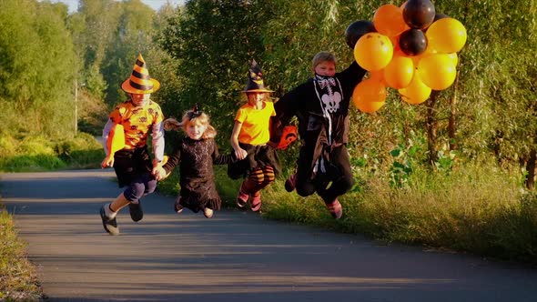 Children in Costumes are Celebrating Halloween