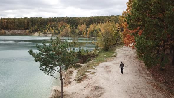 Man Taking Pictures of Nature