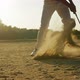 Golfer striking ball in sand - VideoHive Item for Sale