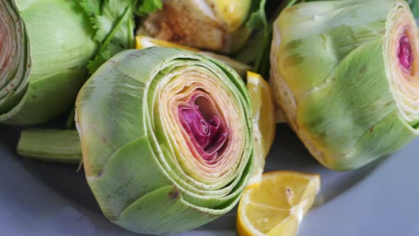 Cut Fresh Artichokes on Plate