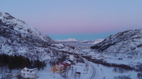 Sunset in Nusfjord's valley - Lofoten island - Drone vidéo of a gradient sky 