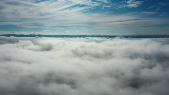 Sun above clouds Timelapse. Tropical scenery. Sunlight at blue sky