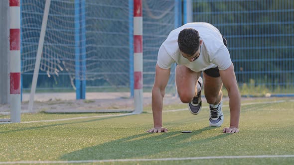 Middle Eastern Footballer Trains Legs Keeps Fit Through Daily Stadium Training Prepares for Match or