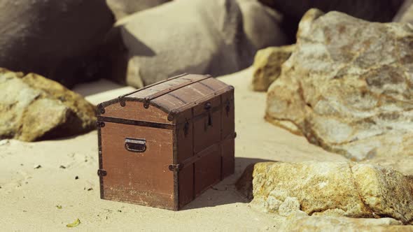 Treasure Chest in Sand Dunes on a Beach