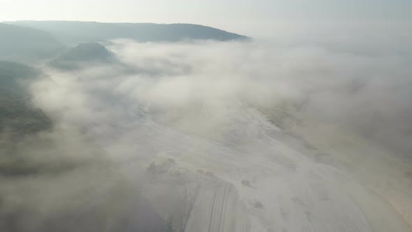 Aerial View of Open Pit Mining Site of Limestone Materials Extraction for Construction Industry with