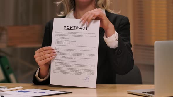 Businesswoman Ripping Contract Into Small Apart and Throws Into Air