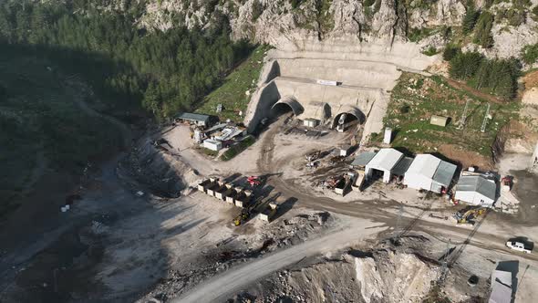 Tunnel development in the mountains aerial view 4 K