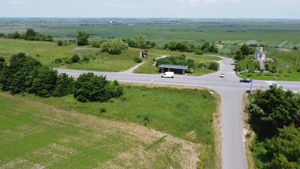 Aerial drone view of a flying over the rural agricultural landscape.