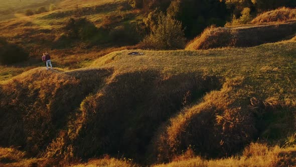 Couple Enjoying The Sunset