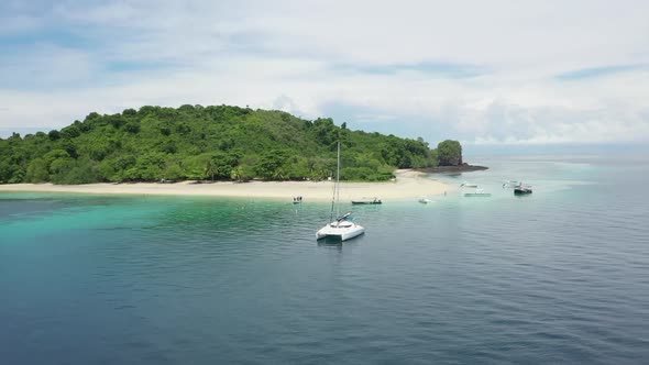 fly by of a small tropical island in the Indian Ocean off Madagascar