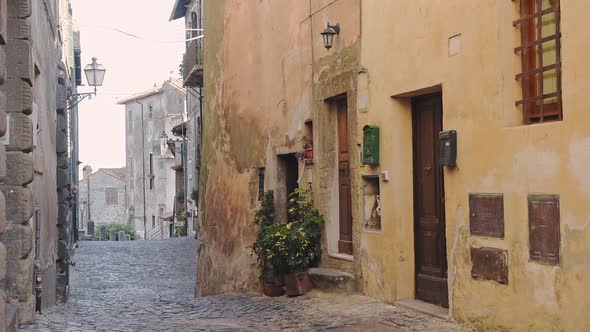 Historical Bracciano town view in a traditional narrow street, Italy