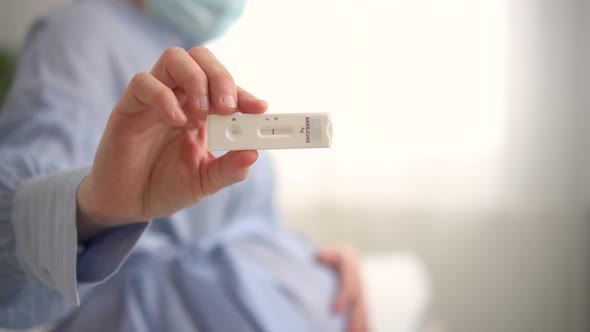 Pregnant Woman Making Test