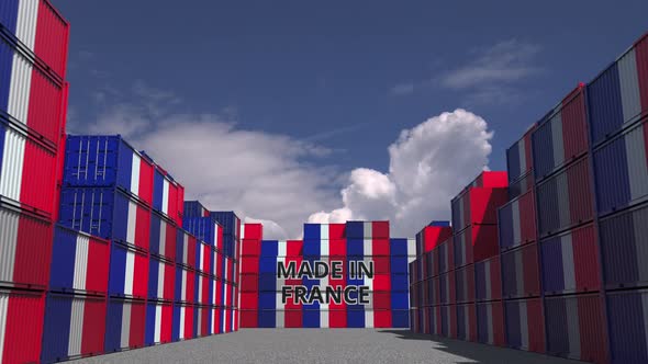 Many Cargo Containers with MADE IN FRANCE Text and Flags