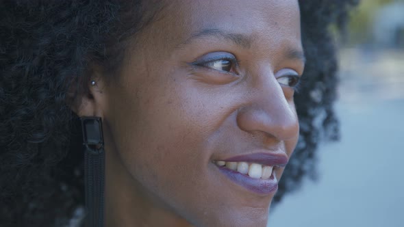 Woman Looking at Camera Turning Head Aside Smiling