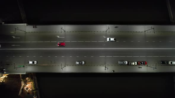 Cars On The Bridge At Night Aerial