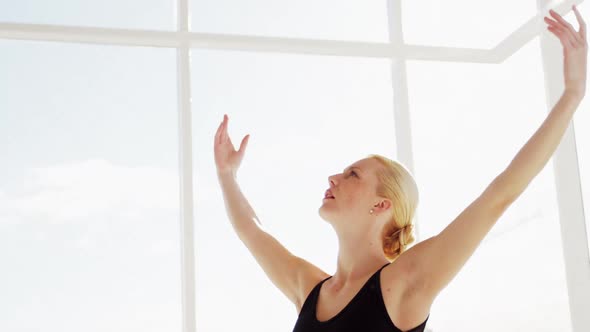 Ballerina performing stretching exercise